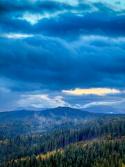 Sunny Autumn Carpathians with Puffy White During The Sunset