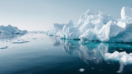 Serene arctic lagoon featuring jagged ice chunks and pale blue waters with natural tranquil atmosphere and space for text