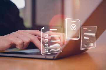 Man hands typing on computer keyboard with document icons, Document data system Report HR technology Concept Manager checking white documents reports papers of files icon in modern office