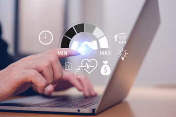 Concept for partnership, collaboration, CRM, B2B marketing, and business relationship Businessman typing and pointing at digital handshake icon surrounded by social connection and networking symbols