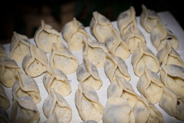 Delicate mushroom dumplings are carefully arranged, celebrating the warmth of Christmas time. This festive display invites joy and culinary delight during the holiday season