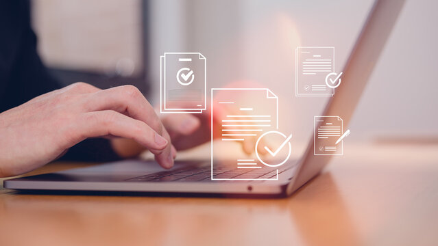 Man hands typing on computer keyboard with document icons, Document data system Report HR technology Concept Manager checking white documents reports papers of files icon in modern office