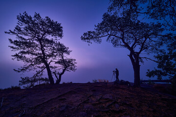 Landscape photographer at blue hour