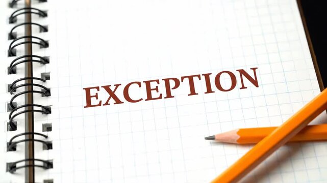 Close up of a spiral notebook featuring the word exception and two yellow pencils providing a clear studio shot ideal for educational material and document creation.