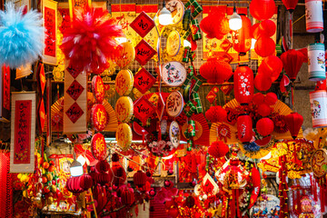 H&agrave;ng M&atilde; Street, Hanoi comes alive with Lunar New Year decorations for the Year of the Horse, featuring traditional red and gold ornaments symbolizing luck, prosperity, and celebration. 