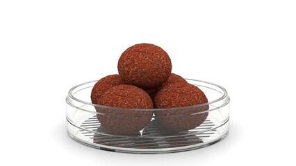 brown laddu in decorative glass bowl
