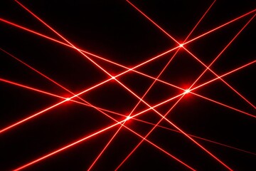 Intersecting red lasers on black background