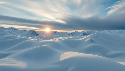 Majestic Snow Covered Mountains at Sunset. Beautiful Winter Landscape with Cloudy Sky