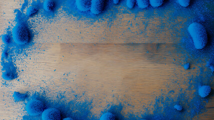 Abstract blue textured pattern on a wood surface showing close up organic shapes and variations
