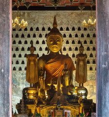 Ancient Buddha image in the ordination hall of the Wat Si Saket Buddhist temple, Vientiane, Laos.