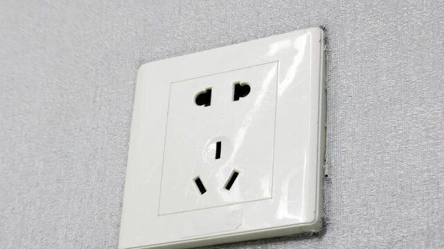 Standard wall sockets in China, China's two flat, parallel pins and three flat pins in a triangle, Chinese power socket, China's electrical system. 