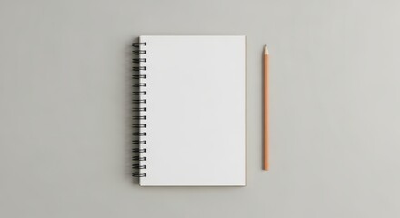 Blank spiral notebook and pencil flat lay mockup for creative projects