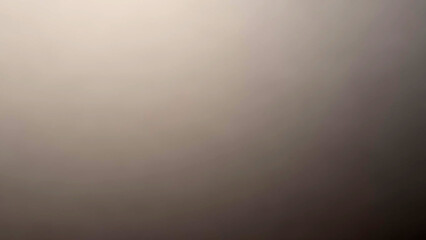 Aerial View of a Gradual Transition from Light to Dark Shades in a Neutral Background