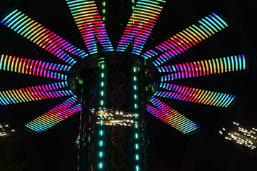 Spinning carousel lights at night