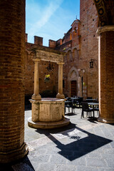 View of the streets of Siena, with its typical Tuscan architecture. Siena, Italy.
