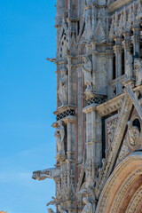 View of the streets of Siena, with its typical Tuscan architecture. Siena, Italy.