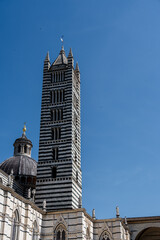 View of the streets of Siena, with its typical Tuscan architecture. Siena, Italy.
