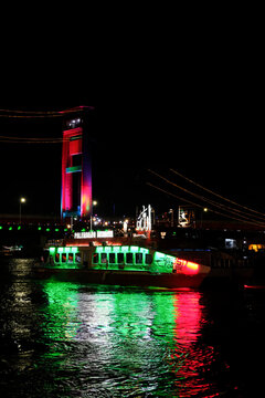 Palembang, Indonesia - March 23, 2025: Night atmosphere around the Ampera Bridge