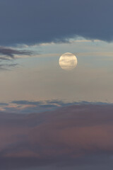 The moon over the four towers in the city of Madrid, Spain