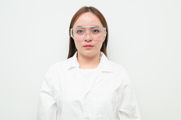 Portrait of Asian female research scientist against white background looking at camera