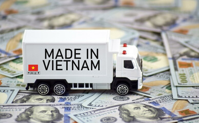 Truck and boxes with the inscription made in Vietnam.
