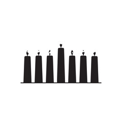 Seven black candles burning with flames on white background