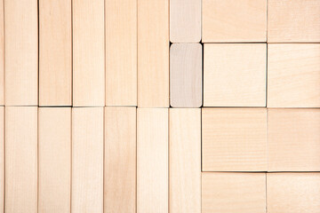 Abstract wooden background with space for text made of cubes and rectangular shapes.