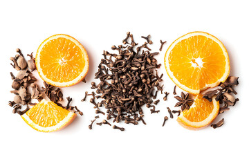 Vibrant orange slices with aromatic spices on white background