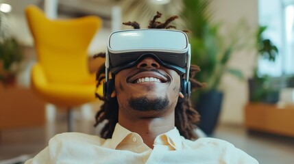A smiling man wearing VR glasses in an office decorated with plants will serve as a dynamic backdrop for presentations on virtual reality and gaming technologies.