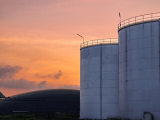 Industrial Crude Oil Chemistry Manufacturing background. Oil refinery chemical factory import and export concept. Chimneys and cooling towers, chemical petrochemical. Storage tank fuel oil industry 