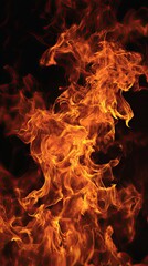 Fiery flames intense orange and red abstract burning on black background