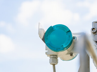 Factory workers air pollution reduction and emissions monitoring. Industrial development environmental monitoring. Eco friendly sustainable manufacturing concepts. Exhaust pipe technology system 