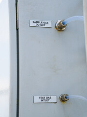 Factory workers air pollution reduction and emissions monitoring. Industrial development environmental monitoring. Eco friendly sustainable manufacturing concepts. Exhaust pipe technology system 