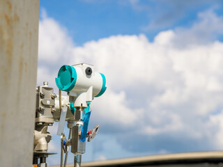 Factory workers air pollution reduction and emissions monitoring. Industrial development environmental monitoring. Eco friendly sustainable manufacturing concepts. Exhaust pipe technology system 