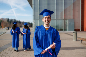 Graduates celebrating academic achievement on a college campus