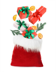 Gift boxes falling into Santa bag against white background. Christmas and New Year celebration