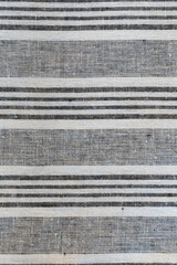 Horizontal striped cotten material close up black and white
