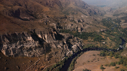 Vardzia — ancient cave city in the rock, touristic place in Georgia, aerial view © Юрий Крылов