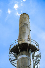 Exhaust pipe clean air factory and industry concept air pollution reduction, environmental protection. Sustainable manufacturing. Environmental day. Energy saving and eco friendly. ESG , CEMS