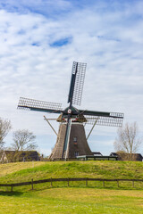 Fototapeta premium Historic windmill the Phenix in Nes, Ameland, Netherlands