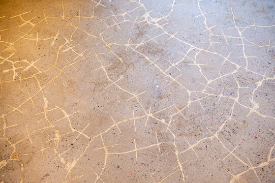 Repaired Screed Floor with Epoxy Resin and Crack Stitching for Renovation