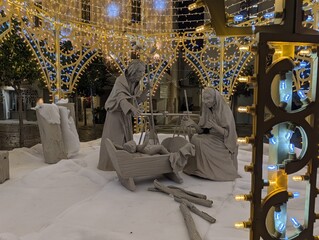 Dettaglio di Ges&ugrave; Bambino nella mangiatoia: presepe di Monopoli - Puglia, Bari, Italia