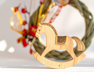 Wooden rocking horse with holiday decor