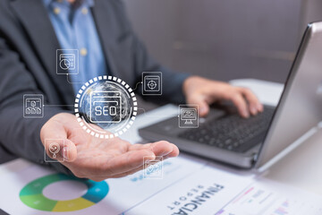 A professional showing a hand with SEO icons, symbolizing digital marketing and online optimization in a business environment.