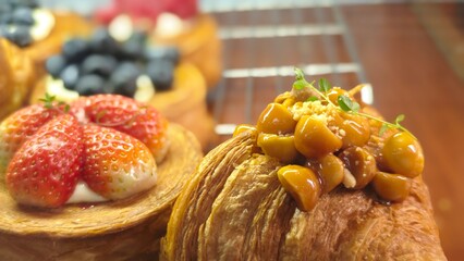 Macadamia with caramel croissant, and berries timbering pastry.