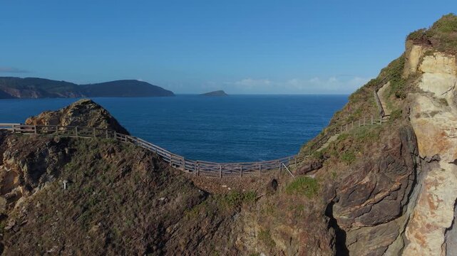 Wooden Walkways At The Hiking Route Of Punta de Fuci&ntilde;o do Porco In O Vicedo, In The Province Of Lugo, Galicia, Spain. Aerial Drone Shot