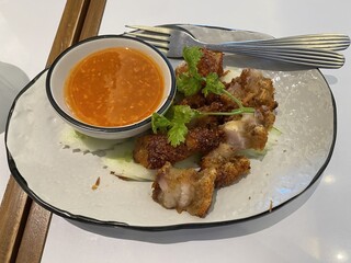 Crispy Fried Chicken with Dipping Sauce on Plate and Fork