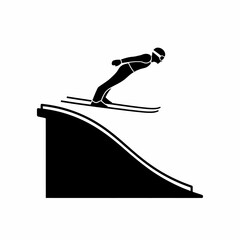 Man skiing down a slope jump.