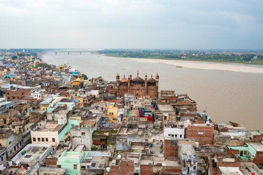 Aerial view of the Alamgir Mosque rising majestically amidst a sea of tightly packed buildings along the Ganges River, Varanasi, Uttar Pradesh, India.