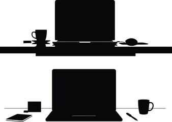 Silhouette of two laptops on a desk with office supplies